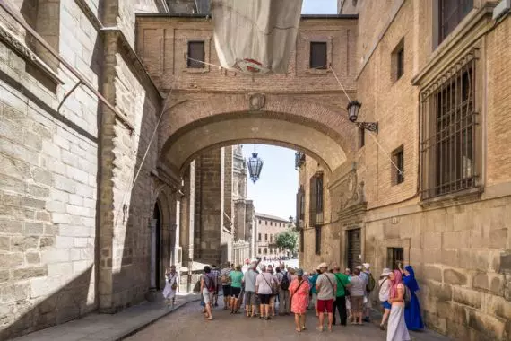 A group of tourists walking around Toledo